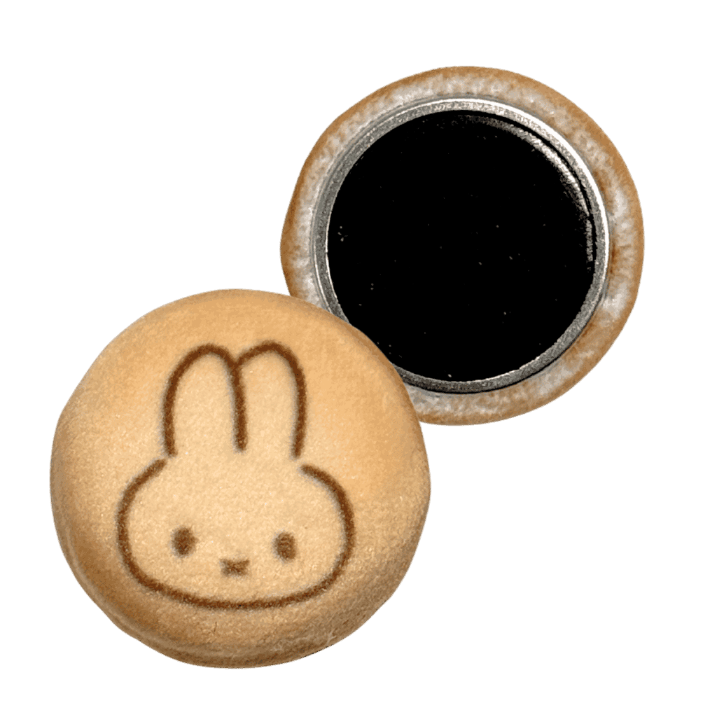 Round plush cookie beige magnet with a rabbit face design